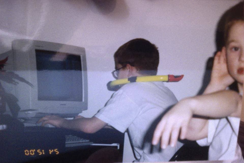 Young founder at a computer